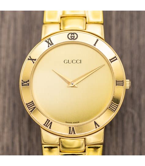 old gucci watch gold